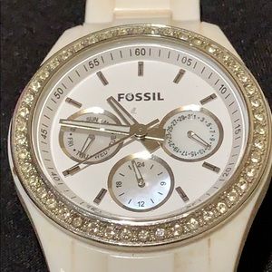 White women’s Fossil watch.